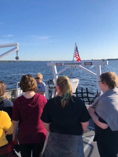 a group of people on a boat