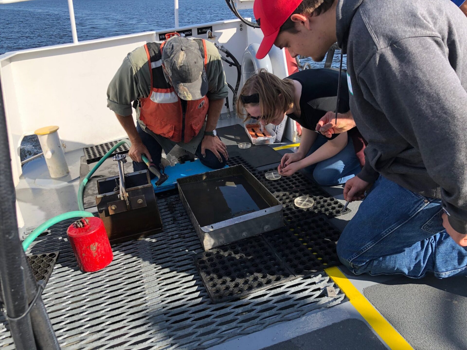 a group of people working on a boat